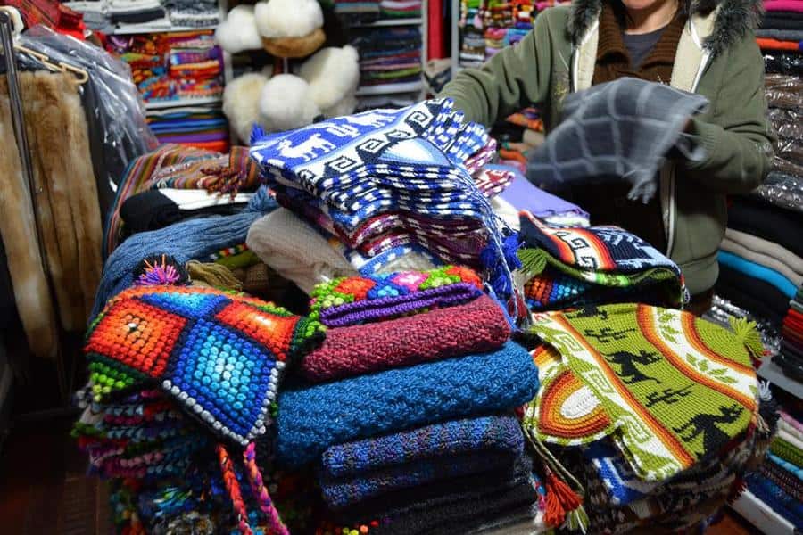 colorful alpaca textiles for sale in Peru- The difference between the llama and the alpaca