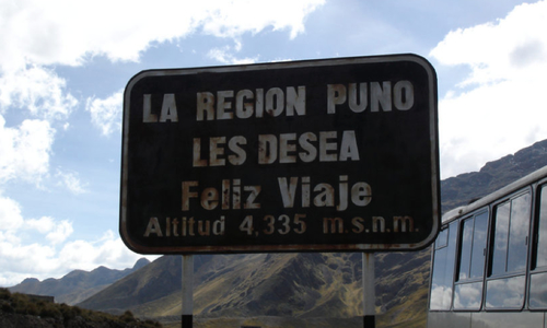 Fighting Altitude Sickness - Roadsign of Puno